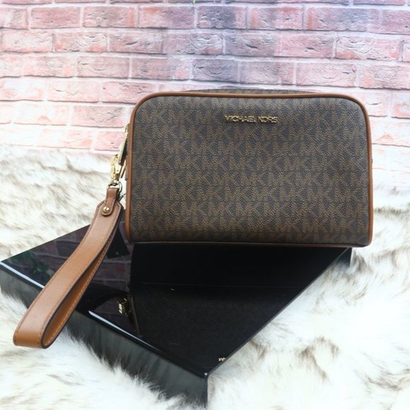 Michael Kors Handbags - Michael Kors Clutch Jet Set Item Md Travel Pouch Wristlet Brown Newet